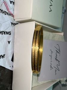Swashaa Elegant 18K Gold Bangle with Greek Key Des