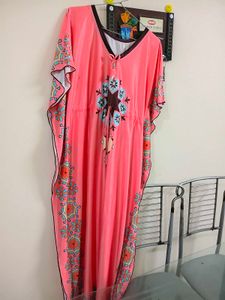 aComfortable Peach Kaftan dress