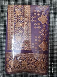 Elegant Purple Saree with Golden Floral