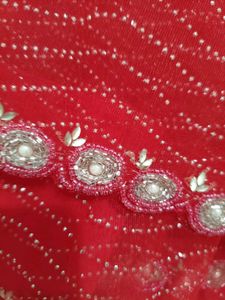 Stunning Red gand stone work saree with blause net