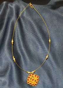 Elegant Gold Necklace with Red Stones