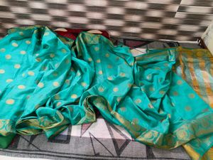Elegant Teal Saree with Gold Border