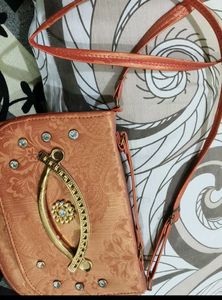 Elegant orange Embellished Sling Bag