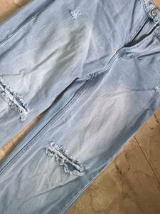 Light Wash Ripped Jeans (never worn)