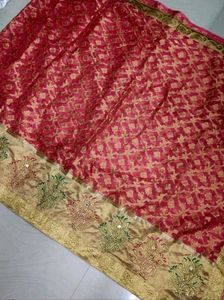 Reddish pink party wear organza tissue silk saree
