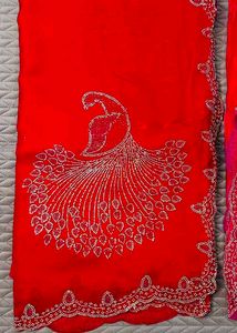 Stunning Red Saree with Peacock Embellishments