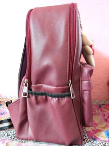 Maroon Backpack with Teddy Charm