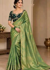 Elegant Green Silk Saree with Embellished Blouse