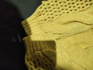 Yellow knitted sweater