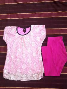 Pink Lace Topwith Magenta bottom wear.