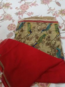 Beige Saree with Peacock Print & Red Blouse