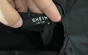 Chic Black Faux Leather Bow Dress