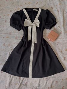Chic Black & White Bow Dress
