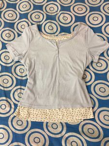 Faded light blue Ribbed Henley Top with Floral Lay