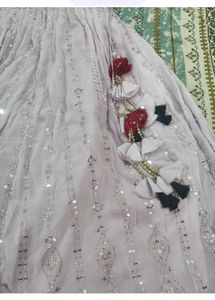 Elegant Lavender Sequined Lehenga Choli