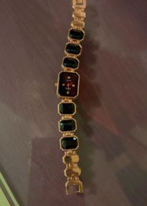 Elegant Gold Watch with Black Accents