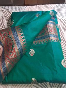 Elegant Teal Saree with Gold Border