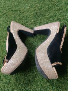 Black And Golden Heels