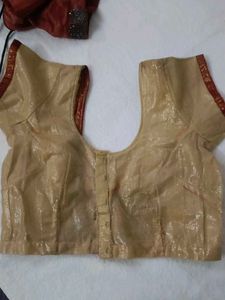 Elegant Gold Blouse with Red Trim