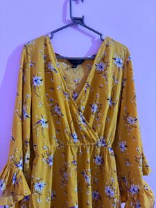 Yellow Floral Wrap jumpsuit