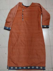 Orange Kurti with Printed Pattern
