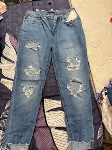 Distressed Blue Denim Jeans
