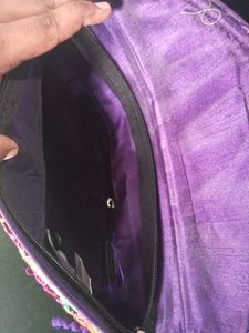 Embroidered Sling Bag.