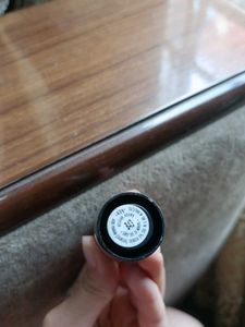 Chic Black Lipstick with Fashionable Face Design