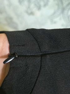 Sleeveless Black Top with White Stripes