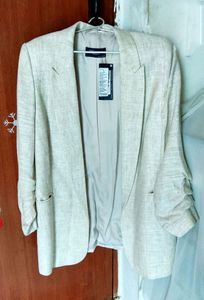 Marks and Spencer linen blazer with ruched sleeves
