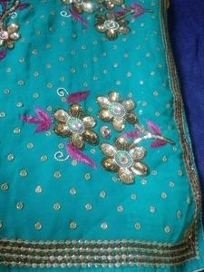 Embellished Teal lehenga Saree with Floral Motifs