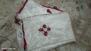Elegant white Saree with Red Border
