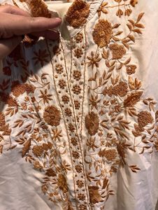 Elegant Cream Kurta with Embroidered Hem