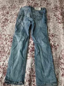 Light Wash Distressed Denim Jeans