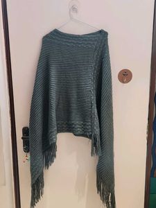 Stylish Knitted Poncho with Fringes