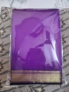 Vibrant Purple Saree with Golden Border