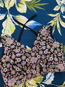 Elegant Black Saree with Floral Blouse