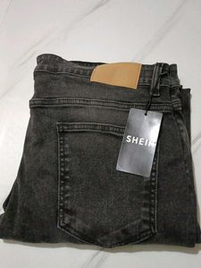Distressed Black Jeans with Star Detail