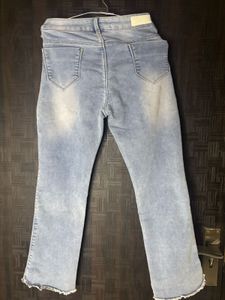 Light Wash Denim Jeans with Pearl Embellishments