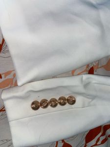 white golden button blazer