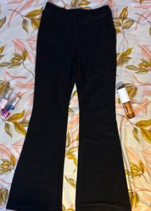 hnm black glittery flare pants