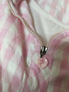 Checked atlomst knee length top with beautiful neck model and zip