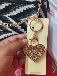 Designer Heart Charm Clutch Bag