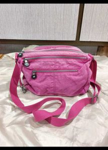Pink Kipling Crossbody Bag with Monkey Charm