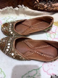 Embellished golden traditional Juttis