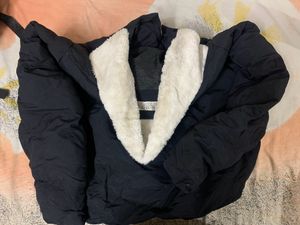 Black Puffer Jacket Had Adjustable Knot At The