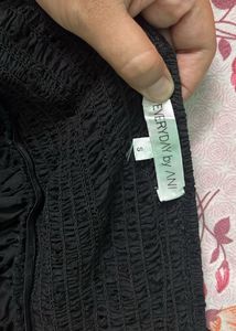Chic Black Off-Shoulder Eyelet Top