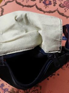 Chic Black Crossbody Bag with Pom Po