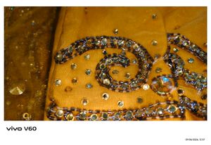 Stunning Yellow Embroidered Kundan Saree