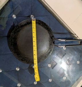 Heavy iron dosa tawa.